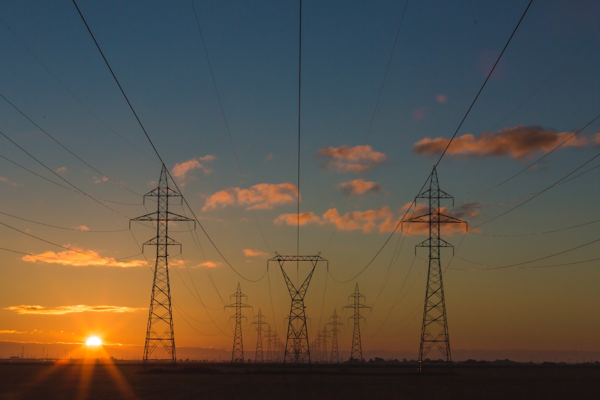 Power lines against sky